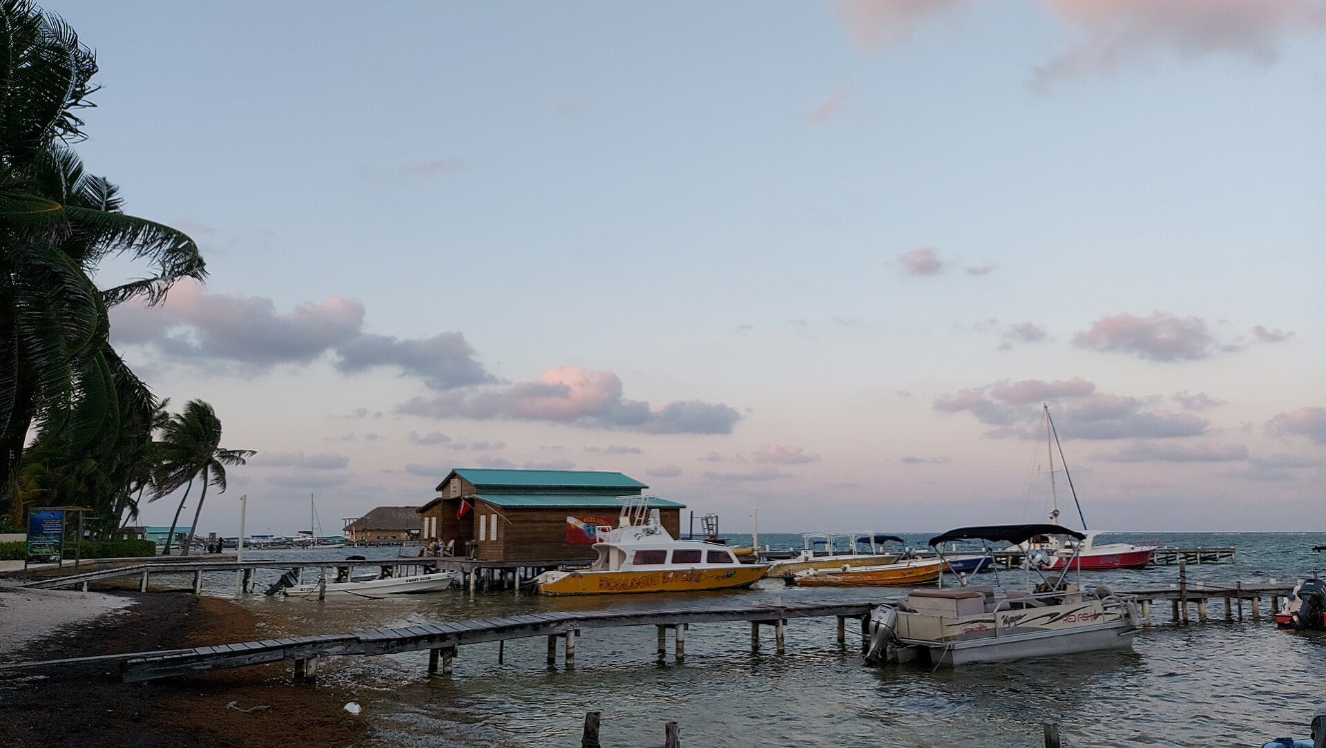 Dive boats and jetties along Barrier Reef Drive in San Pedro