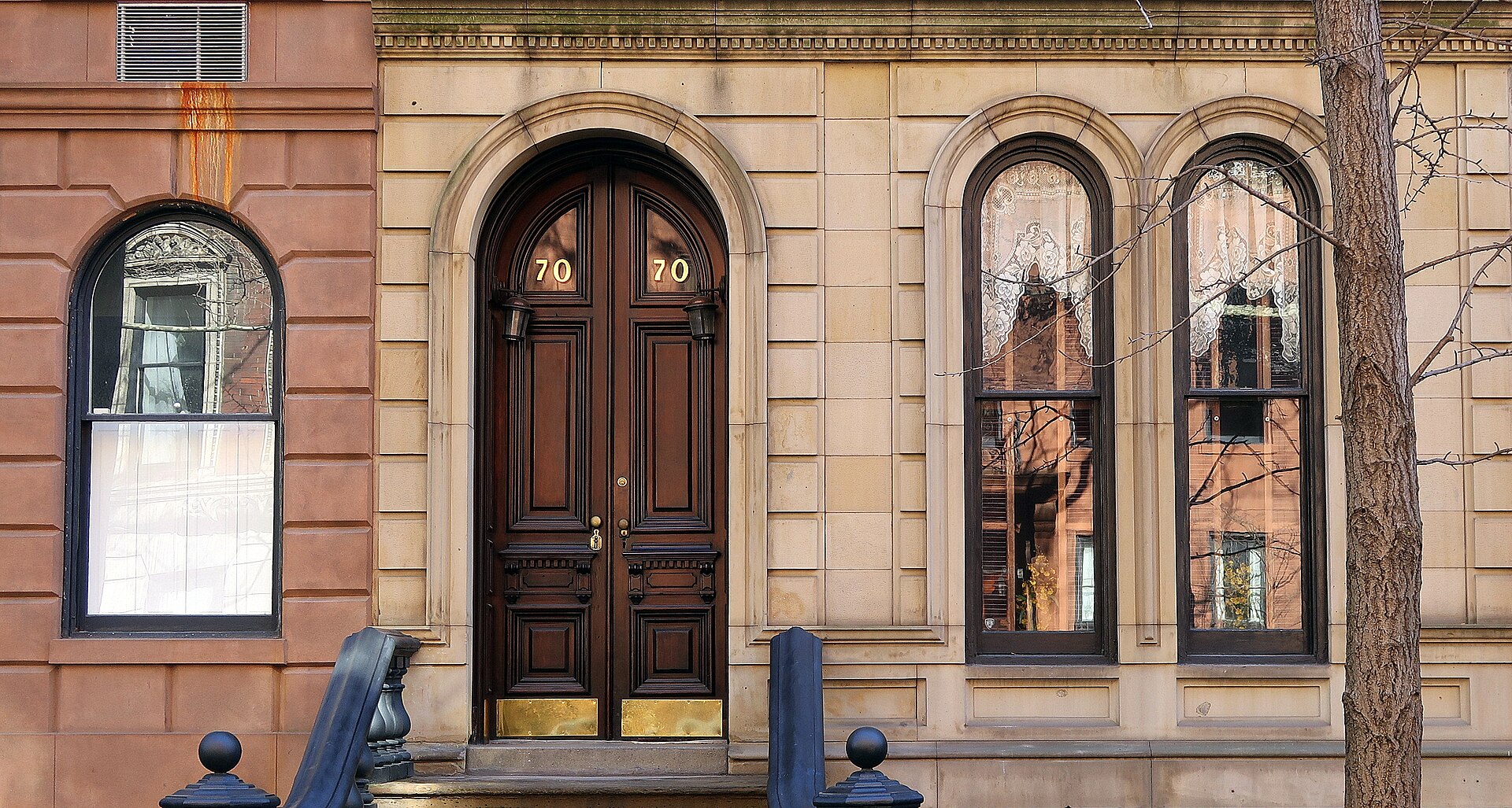 Detailed brownstone doorway and arched windows in Greenwich Village