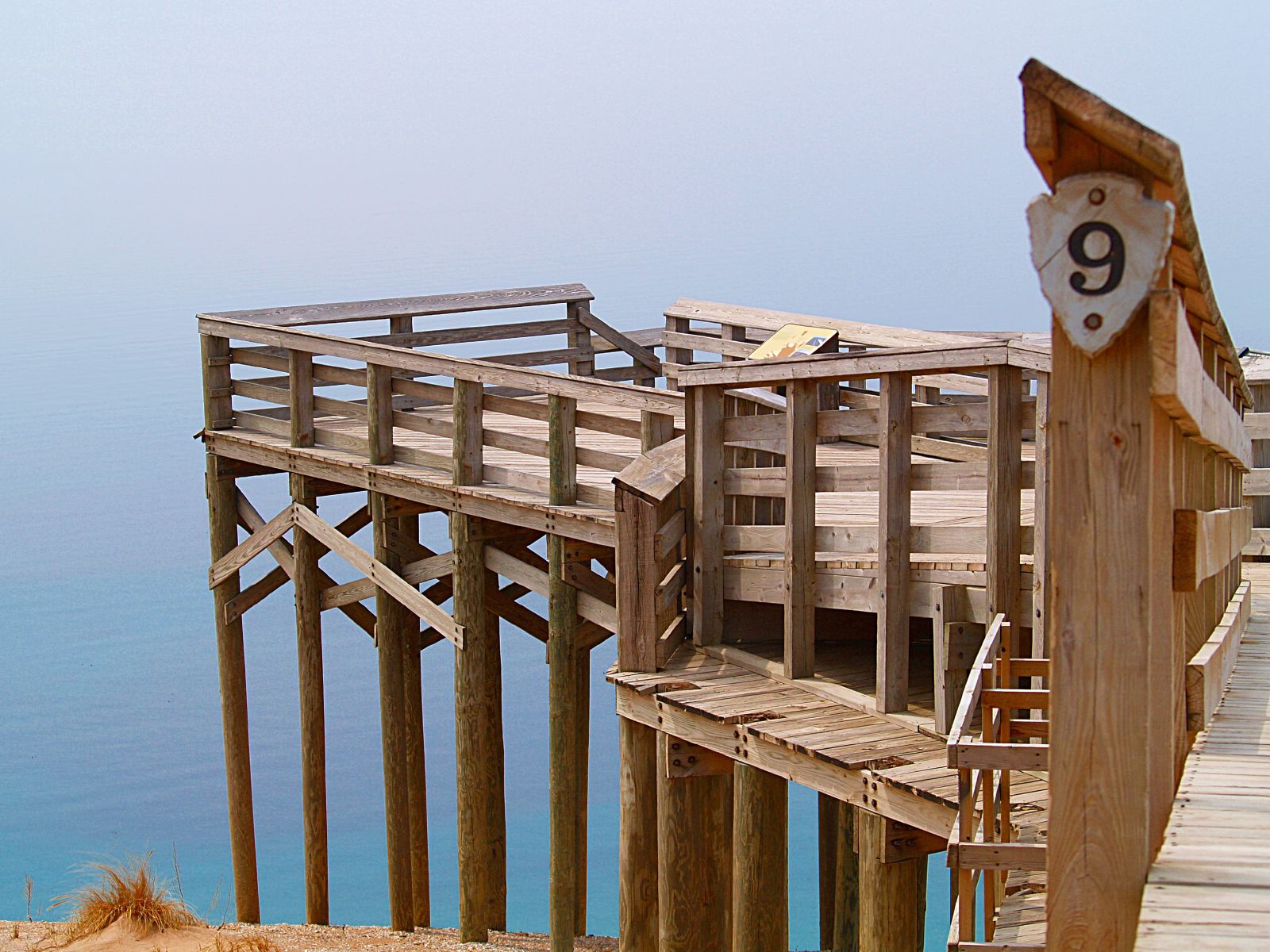 A numbered scenic-drive overlook projects above the Lake Michigan dunes