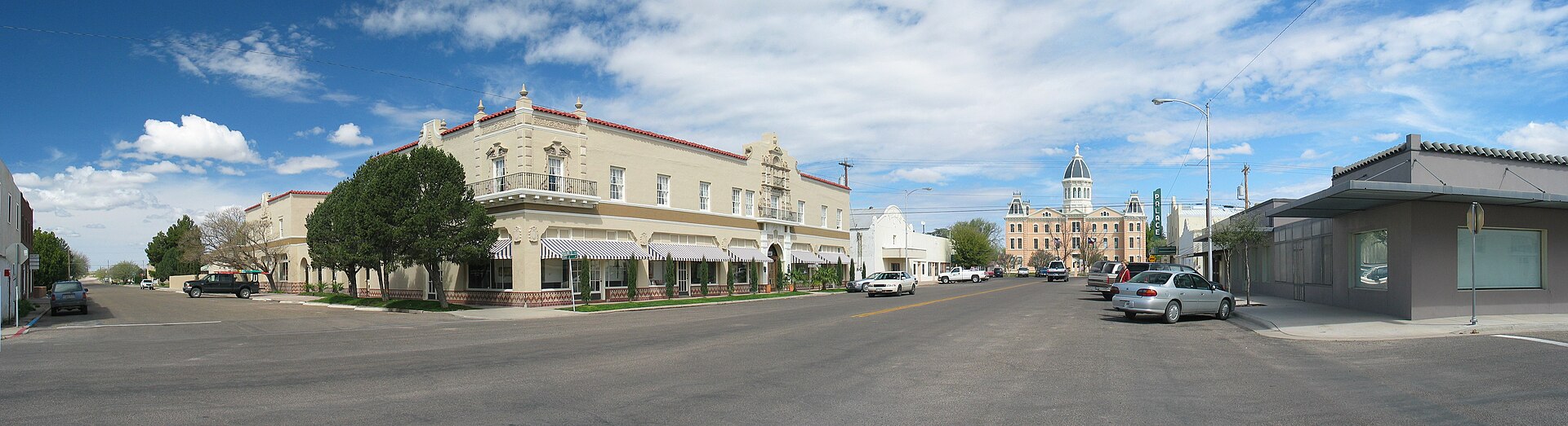 Marfa's low desert townscape stretches beneath a vast West Texas sky