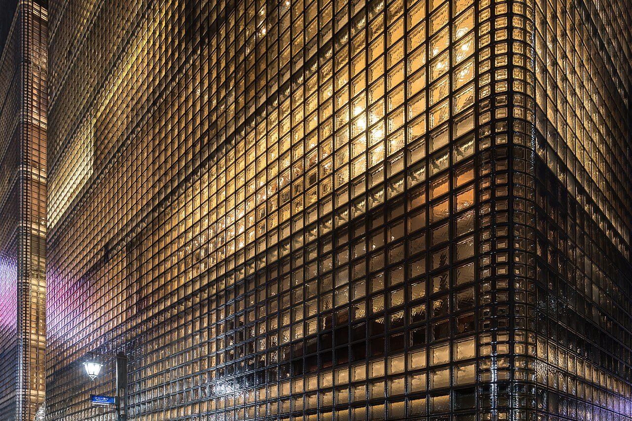 Ginza & central Tokyo: Exterior view of the illuminated facade of Maison Hermès, Ginza, Tokyo, Japan