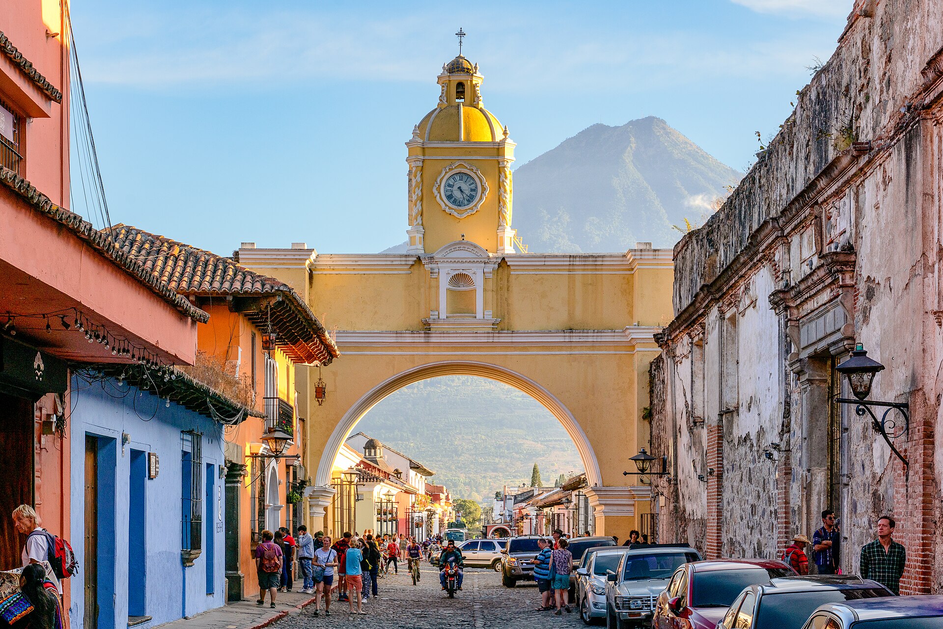 Santa Catalina Arch, cobbled streets, and Volcán de Agua in Antigua Guatemala