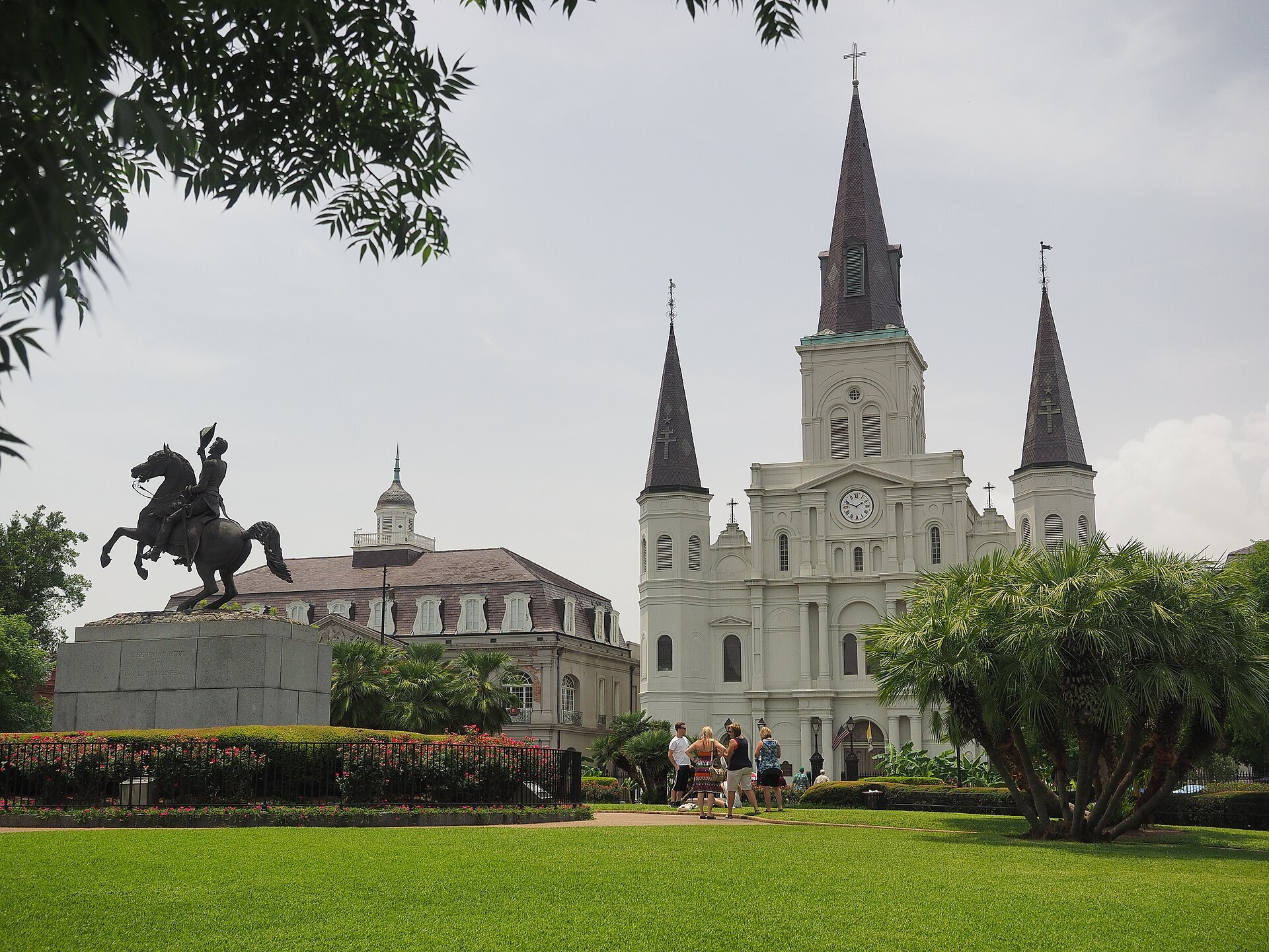 St. Louis Cathedral, the Cabildo, Jackson statue, gardens, and visitors in the historic French Quarter