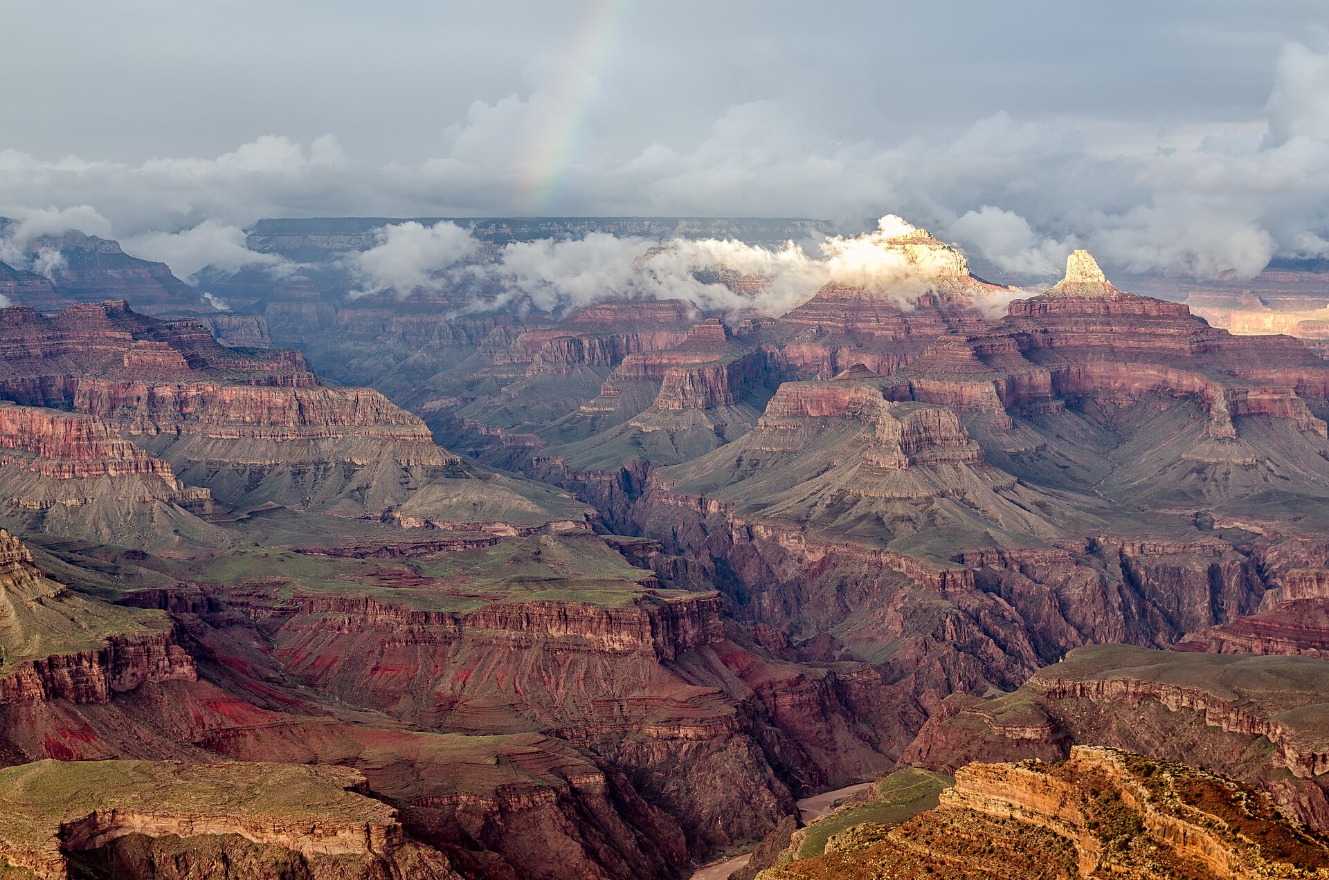 Rainbow spanning the layered Grand Canyon landscape from Hopi Point