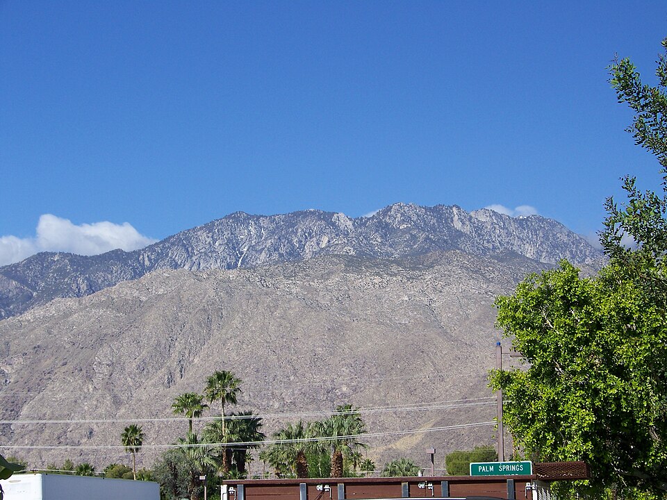 Palm trees and mid-century streets beneath Mount San Jacinto in downtown Palm Springs