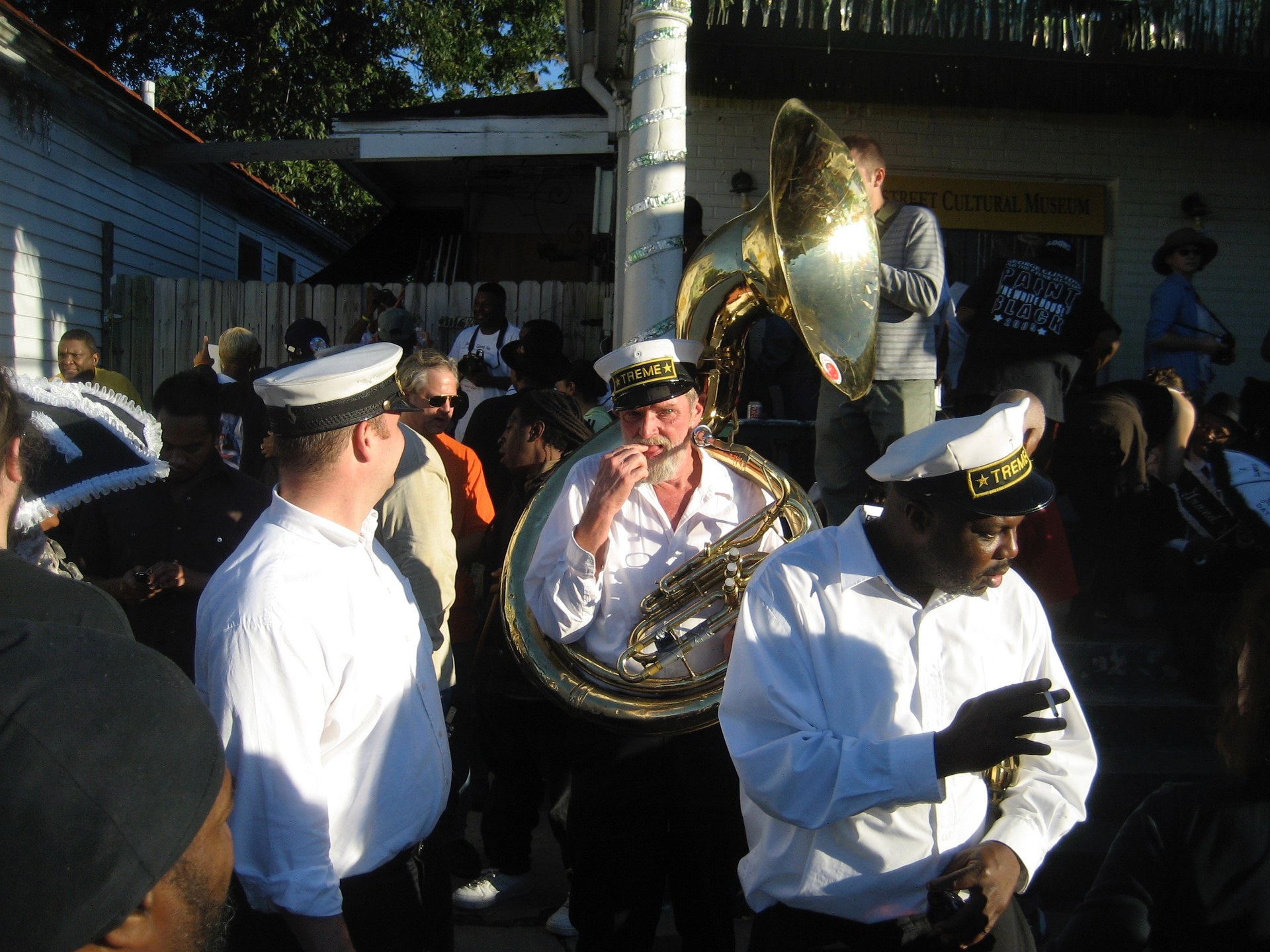 A Tremé brass band and community gathering outside the Backstreet Cultural Museum