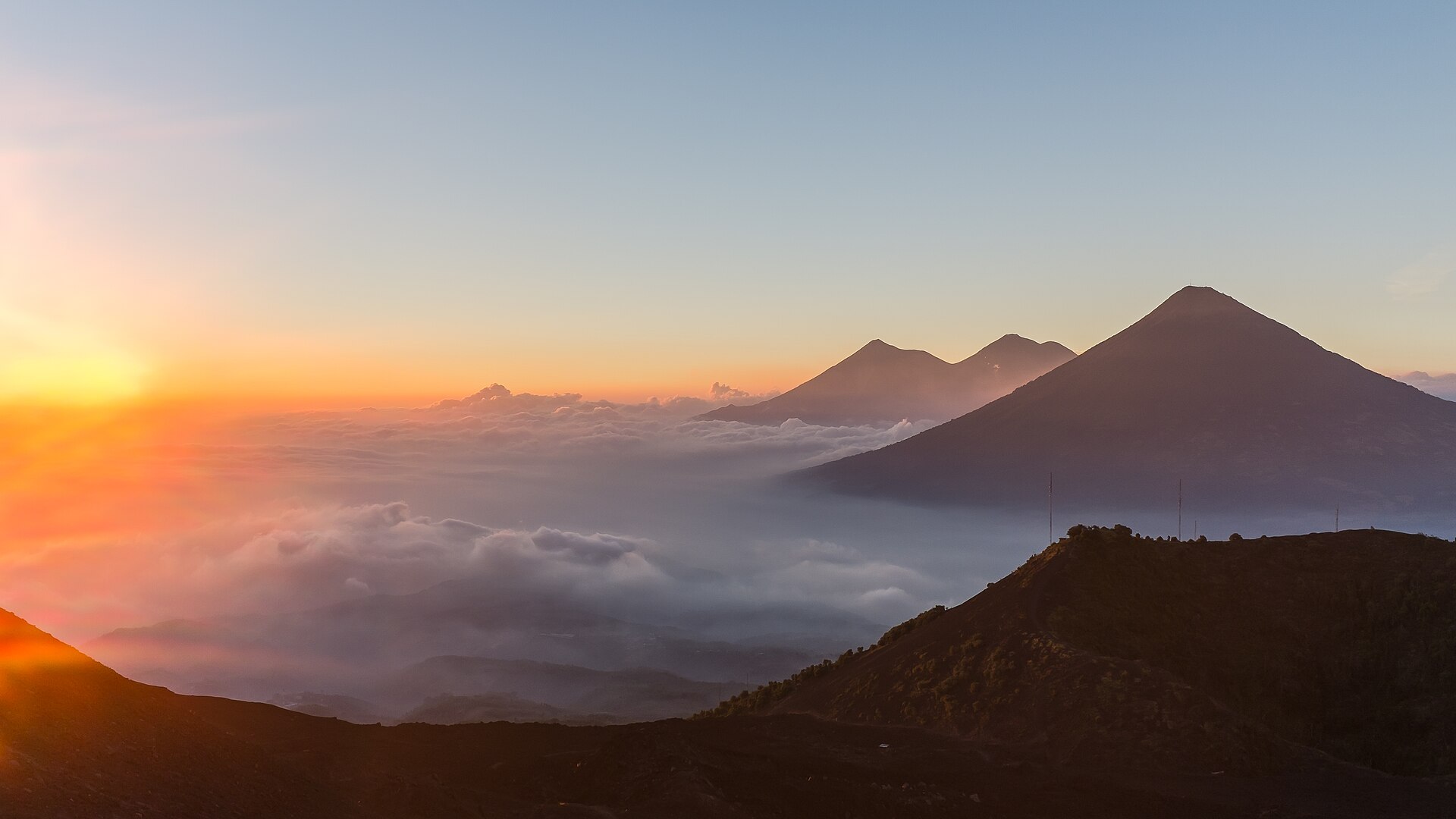 Guatemala's volcanic chain seen from Pacaya above a bank of cloud