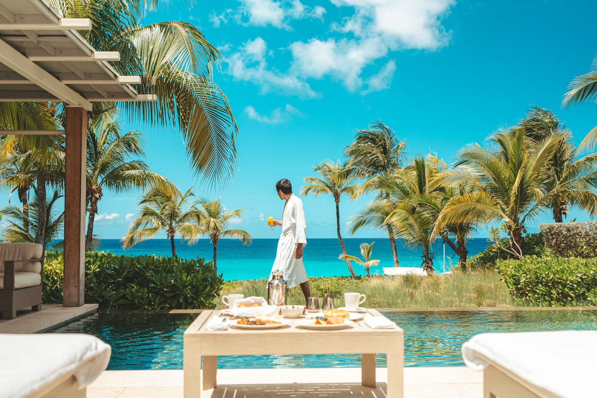 Anguilla: boutique luxury villa, private pool, breakfast, and guest overlooking the Caribbean