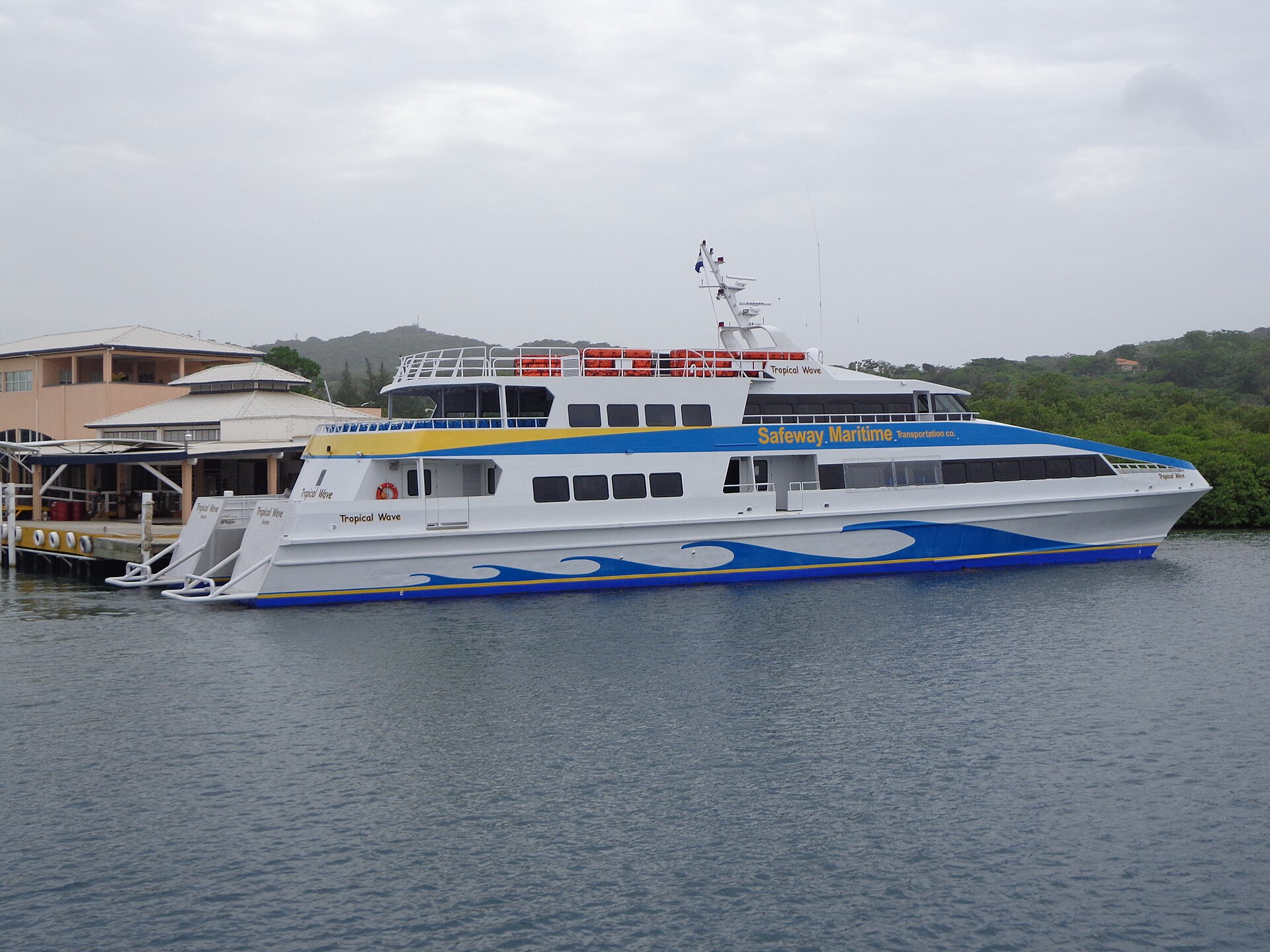Roatán's green Caribbean shoreline and harbor in Honduras's Bay Islands