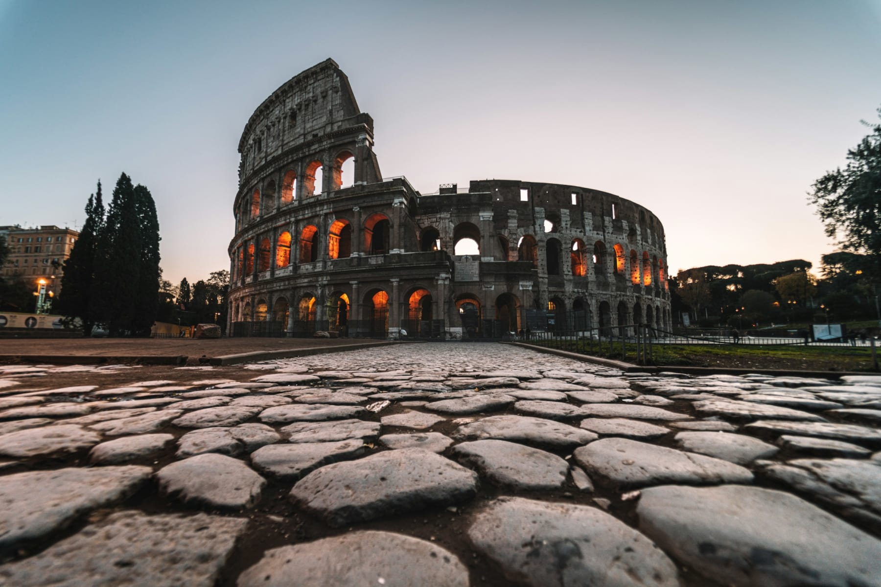 The Colosseum and historic Rome in warm Italian light