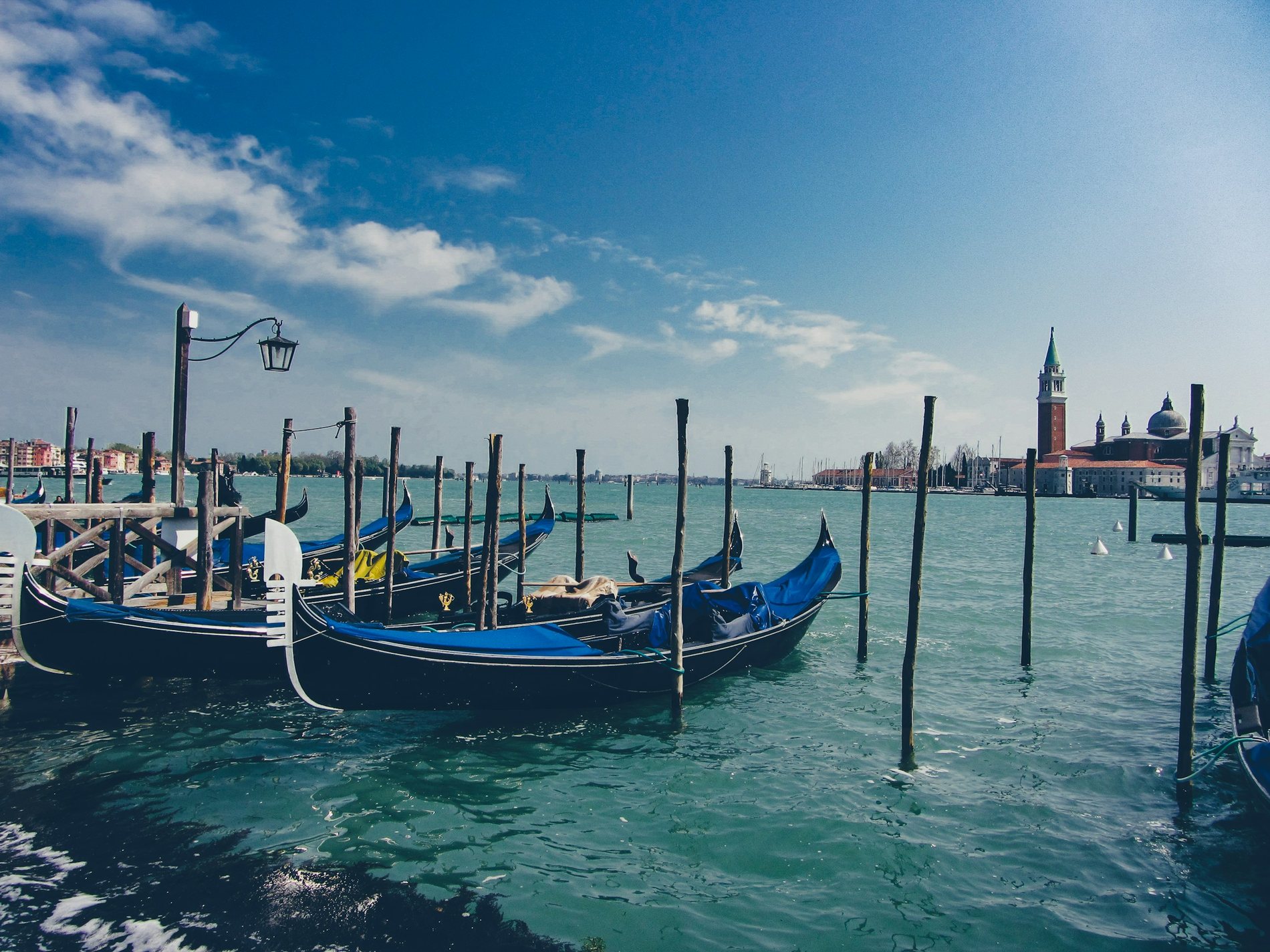 Venice lagoon, boats, and the historic skyline of St Mark's