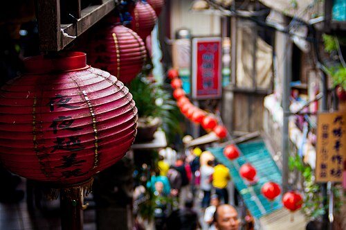 A broader city stay for Taipei: Chinese lanterns in market (Unsplash)