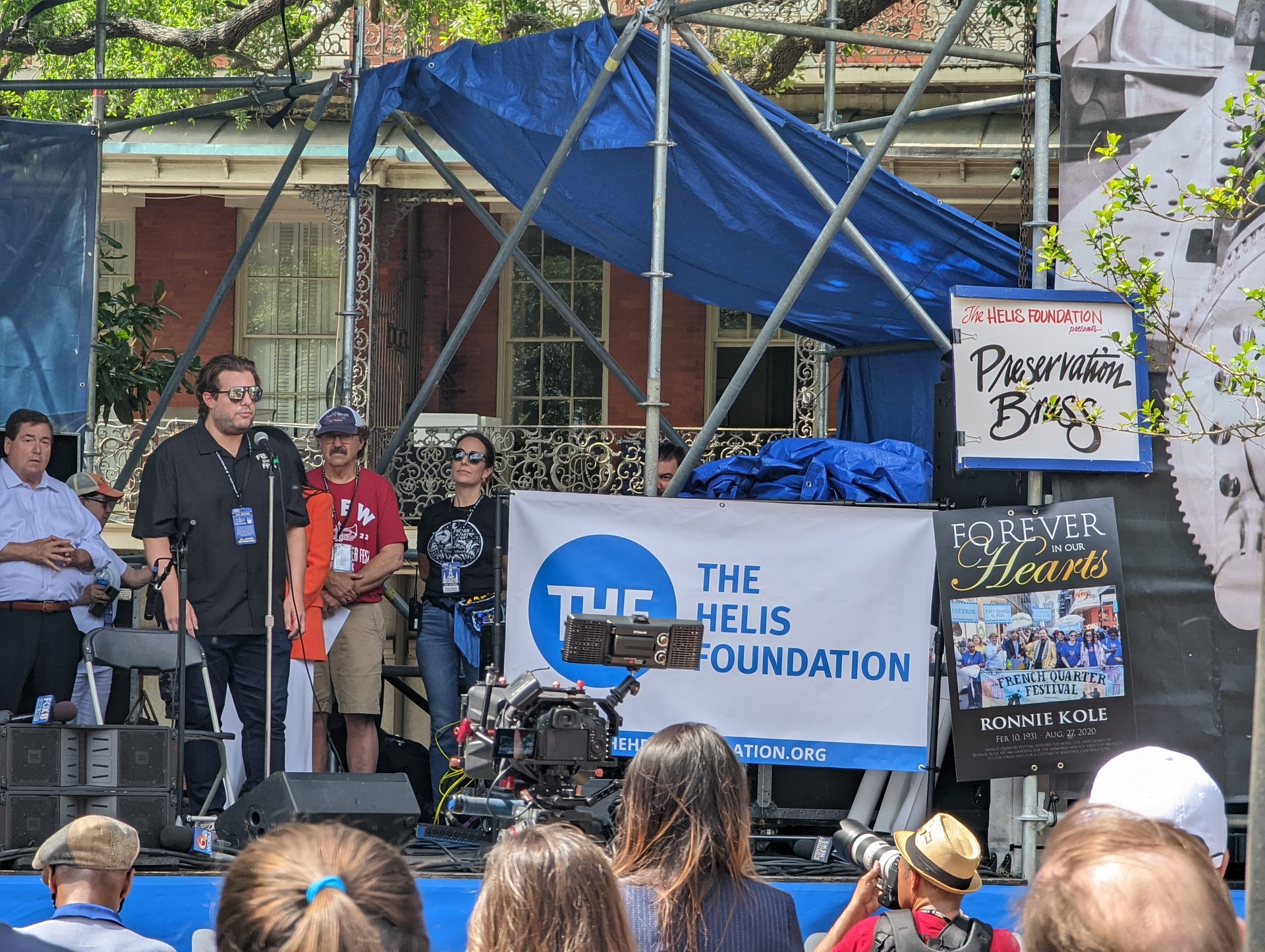 Visitors gathered for a French Quarter Festival program among historic New Orleans buildings
