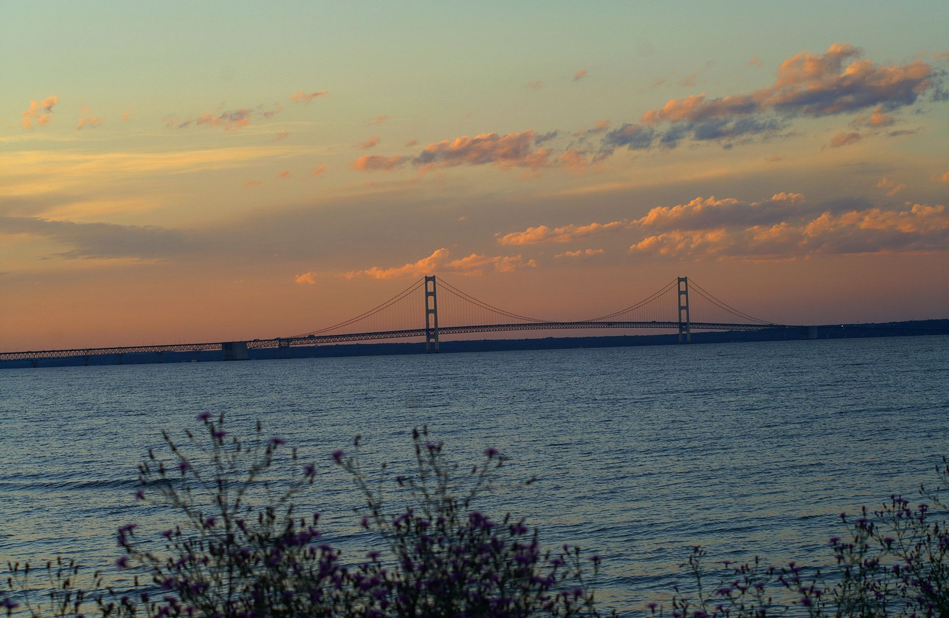 The Mackinac Bridge spans the meeting of Lakes Michigan and Huron at dusk