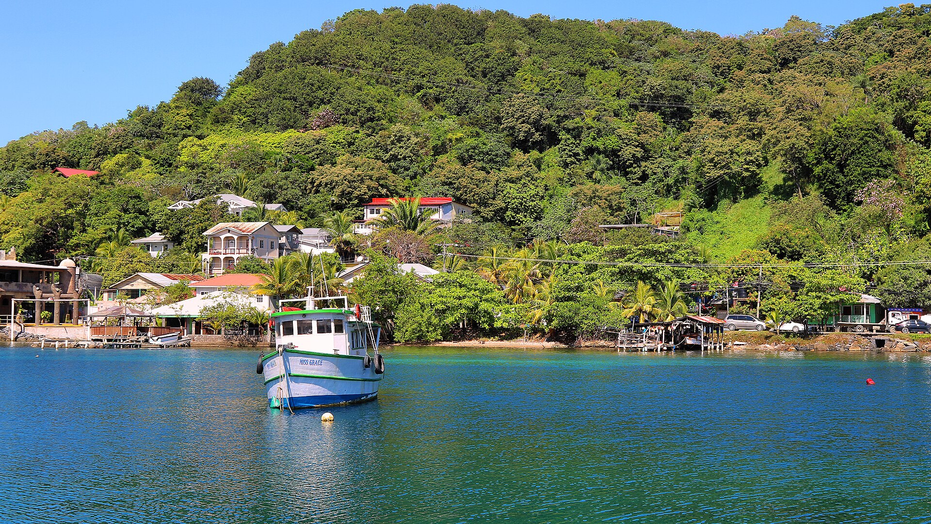 Boats and the Caribbean waterfront at Coxen Hole on Roatán, Honduras