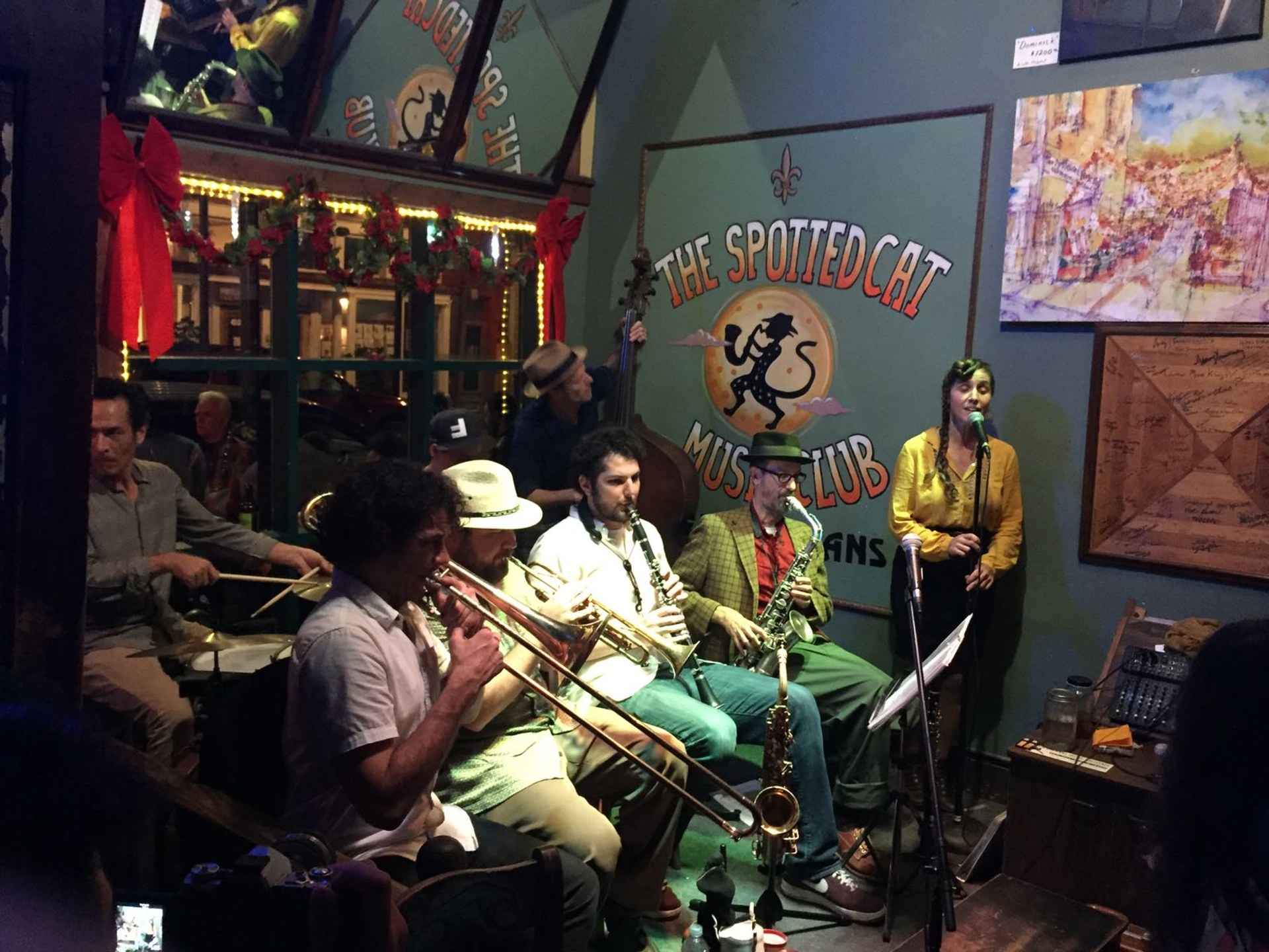 A full jazz band performing inside the Spotted Cat Music Club on Frenchmen Street