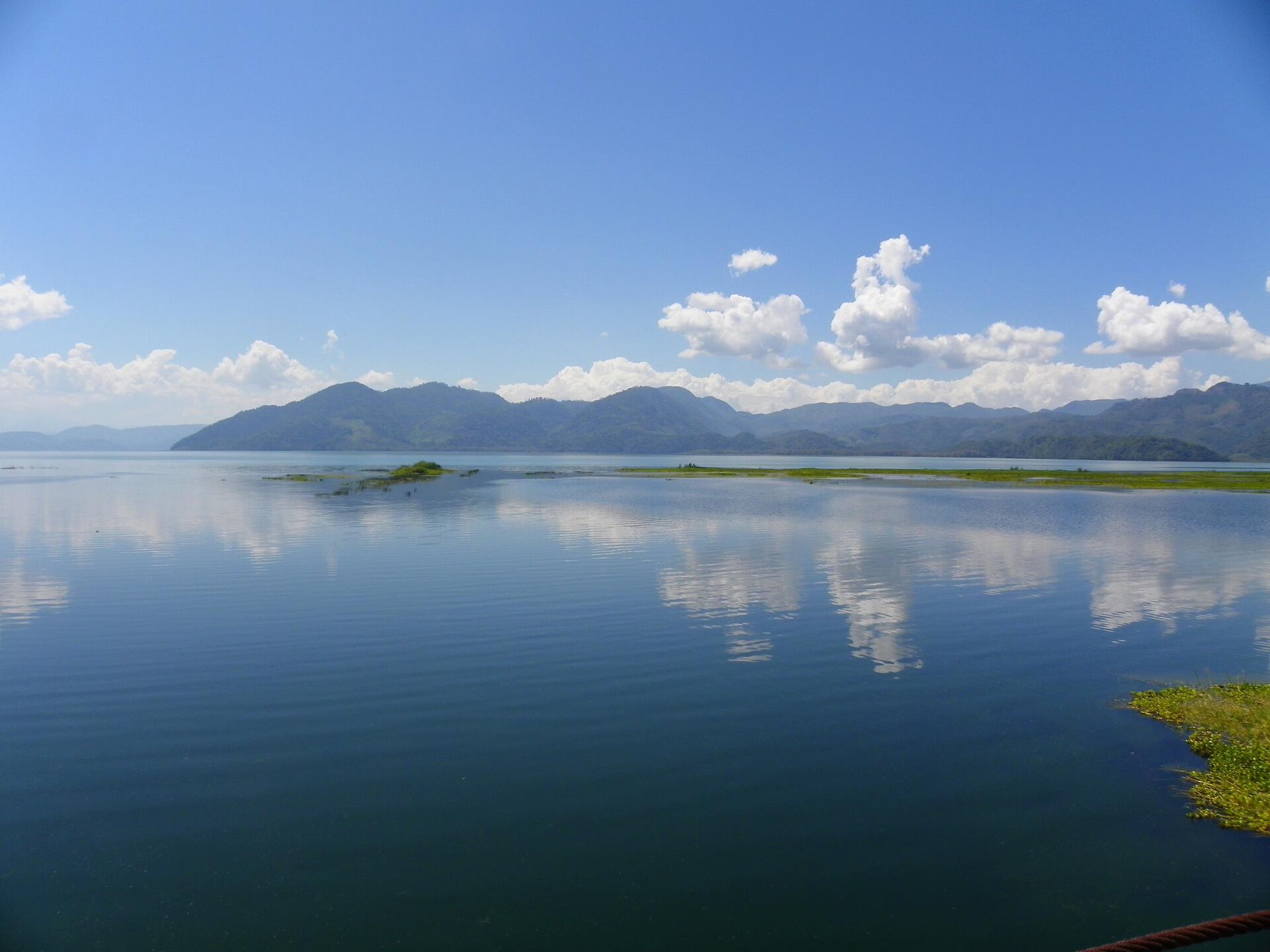 Lake Yojoa framed by green mountains in central Honduras