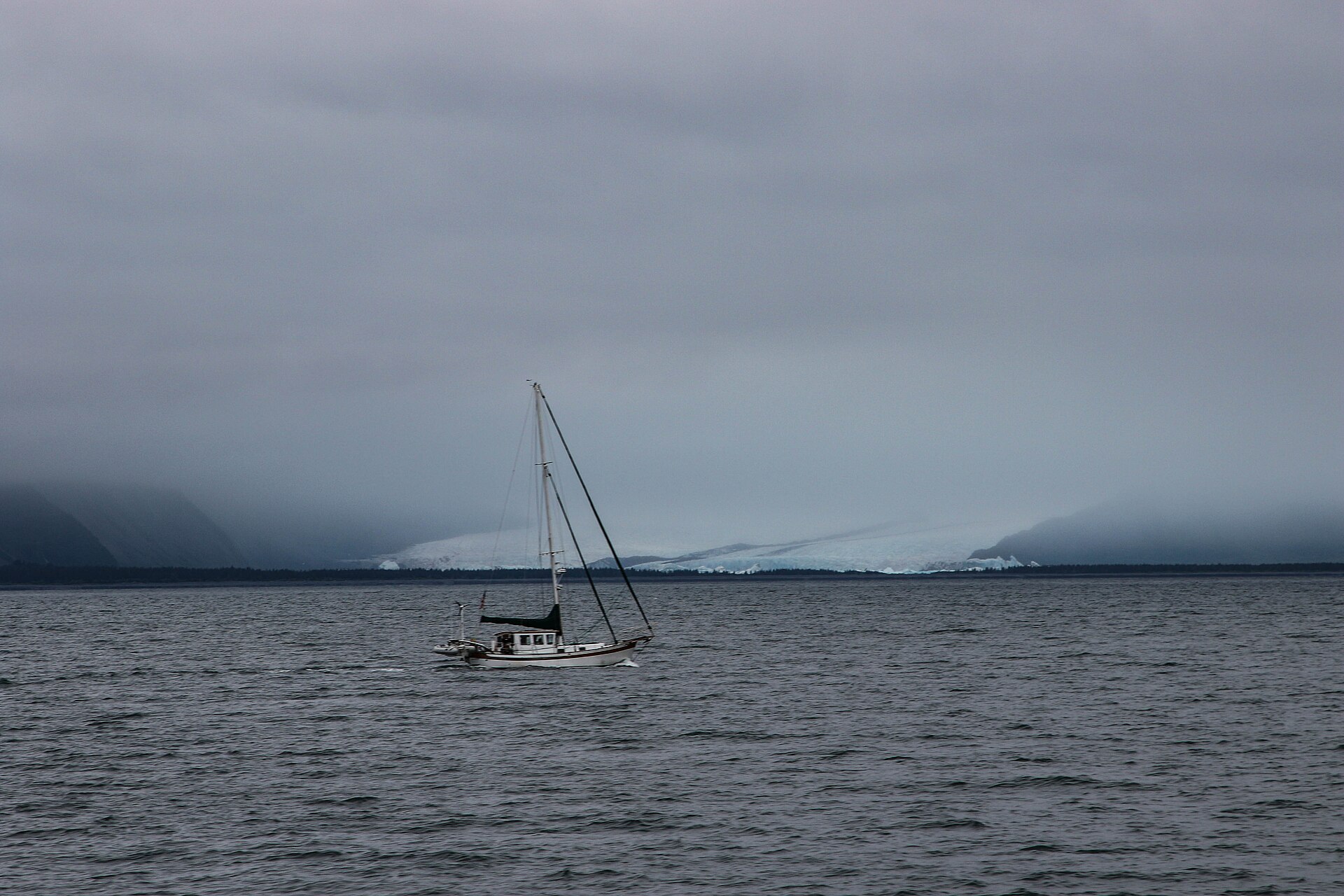 Glacier and excursion vessel in the coastal wilderness of Kenai Fjords National Park