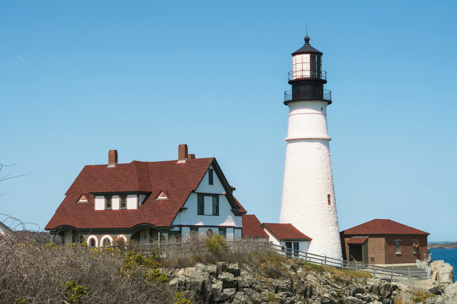 Portland Head Light and its red-roofed buildings in Cape Elizabeth, Maine