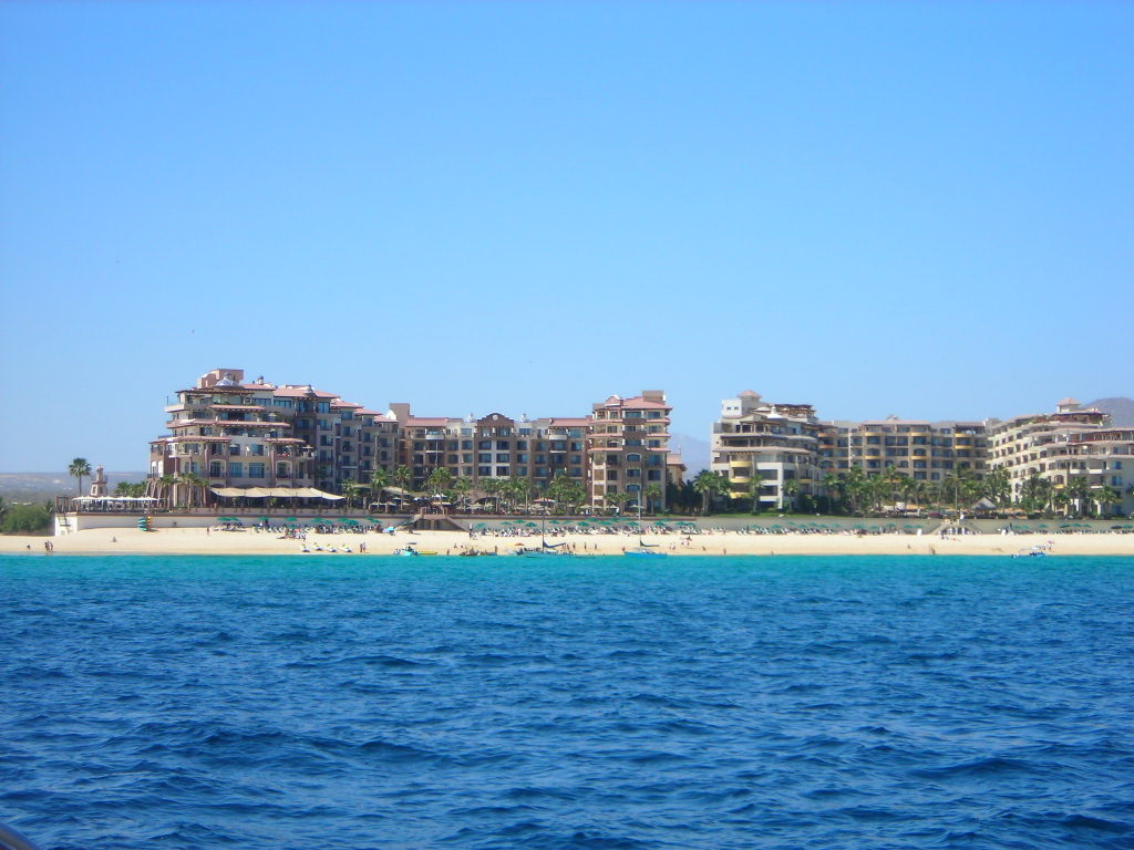 Beachfront resorts between the Baja hills and the Sea of Cortez at Cabo San Lucas