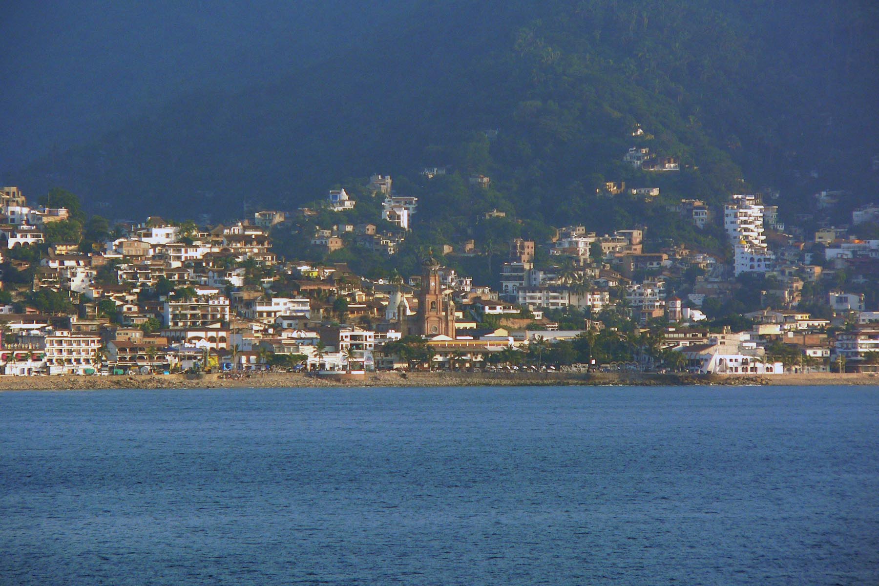 Puerto Vallarta town center, Our Lady of Guadalupe church, hillside homes, and Banderas Bay