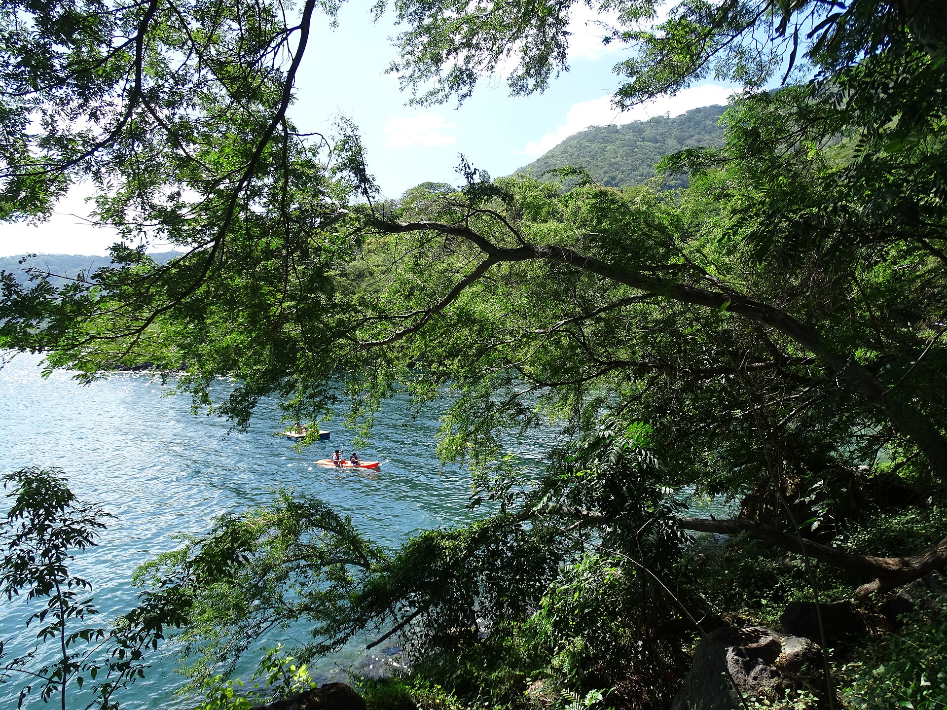 Blue water and forest at Laguna de Apoyo near Granada
