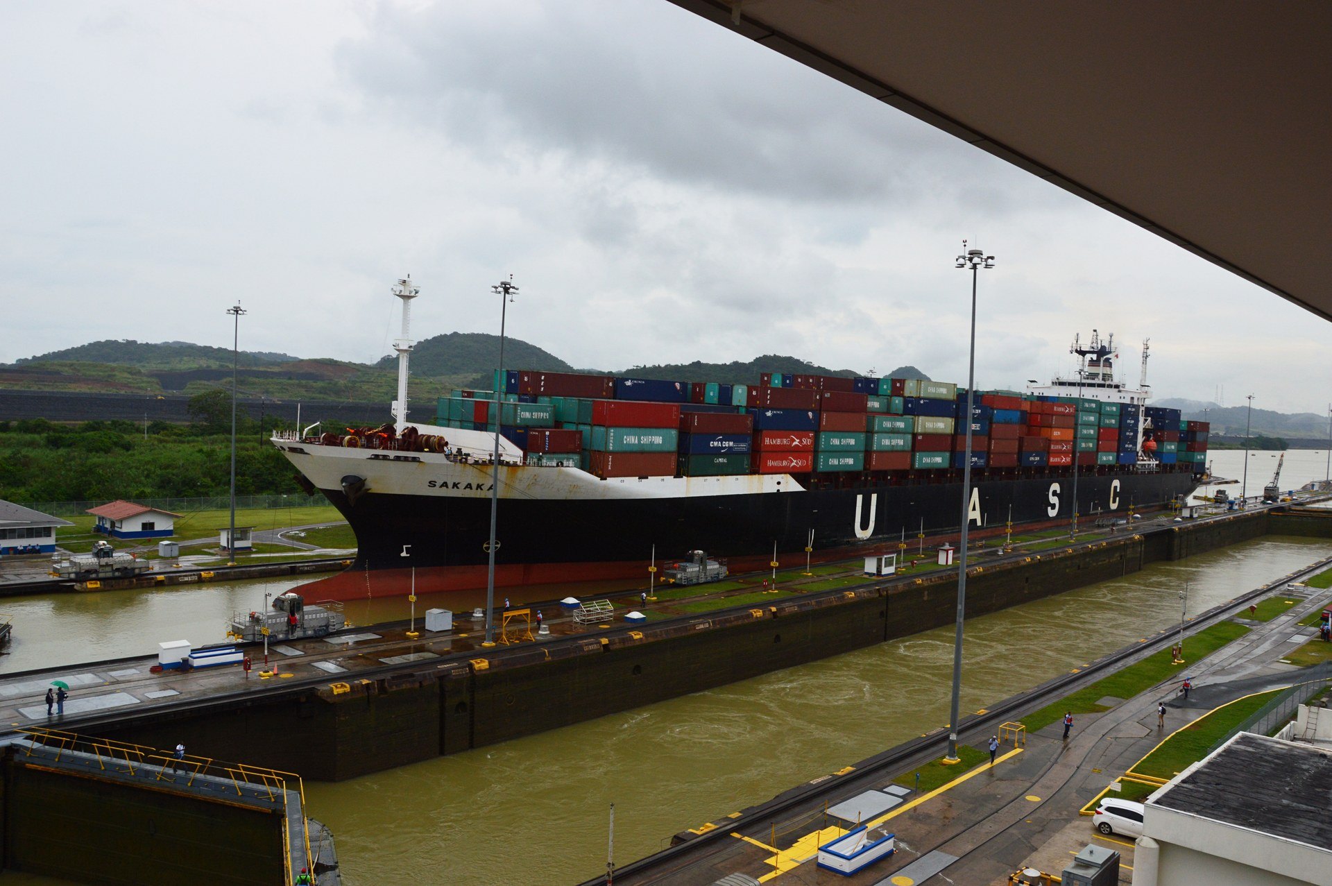 Container vessel crossing Miraflores Locks in Panama