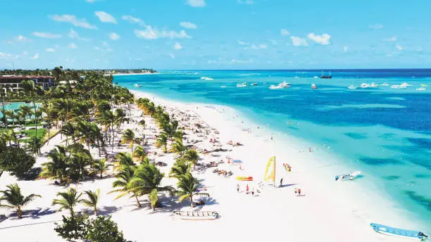 Dominican Republic: aerial view of a palm-lined Punta Cana and Bávaro white-sand beach with turquoise water