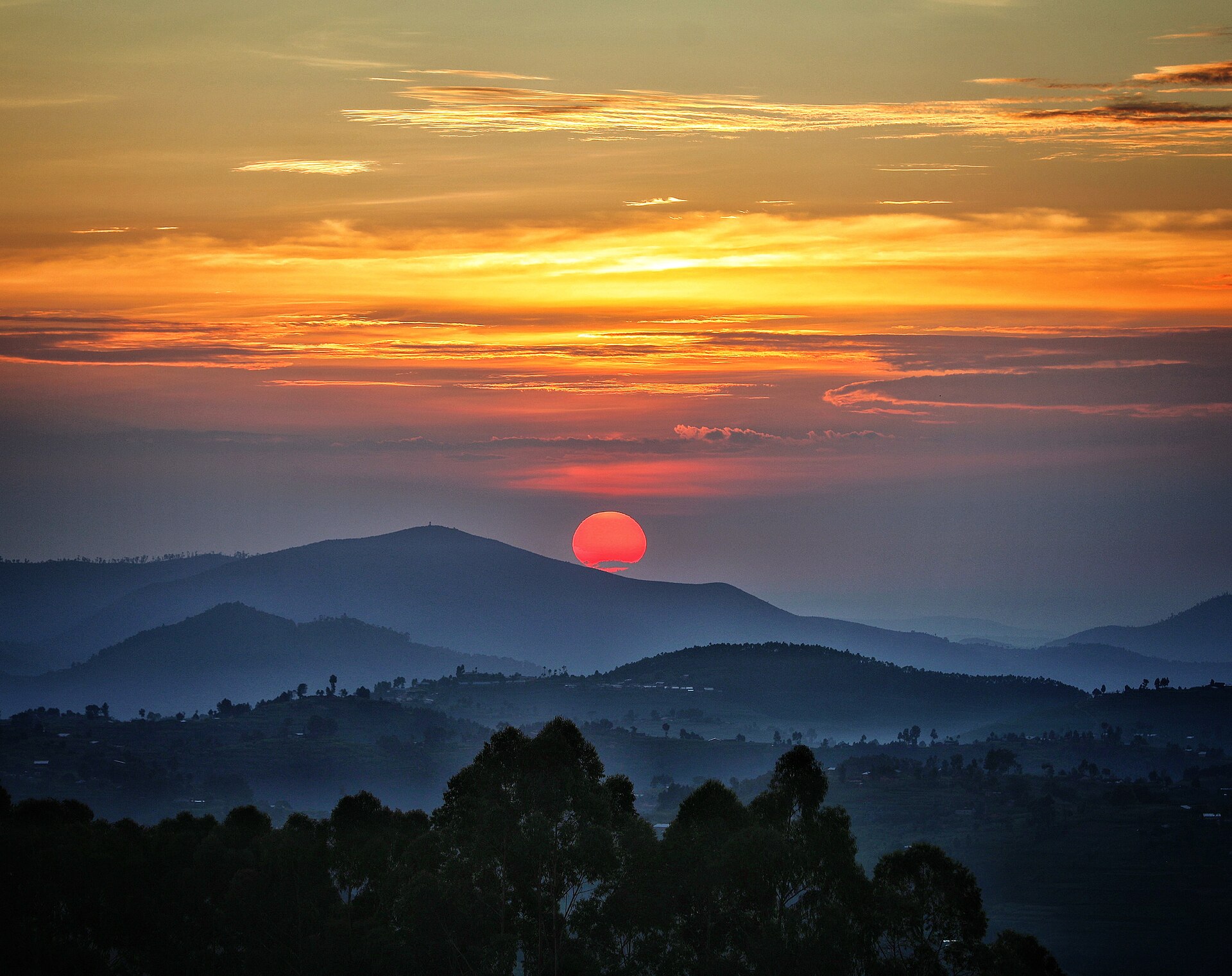 Sunrise over the layered rainforest canopy of Nyungwe National Park, Rwanda