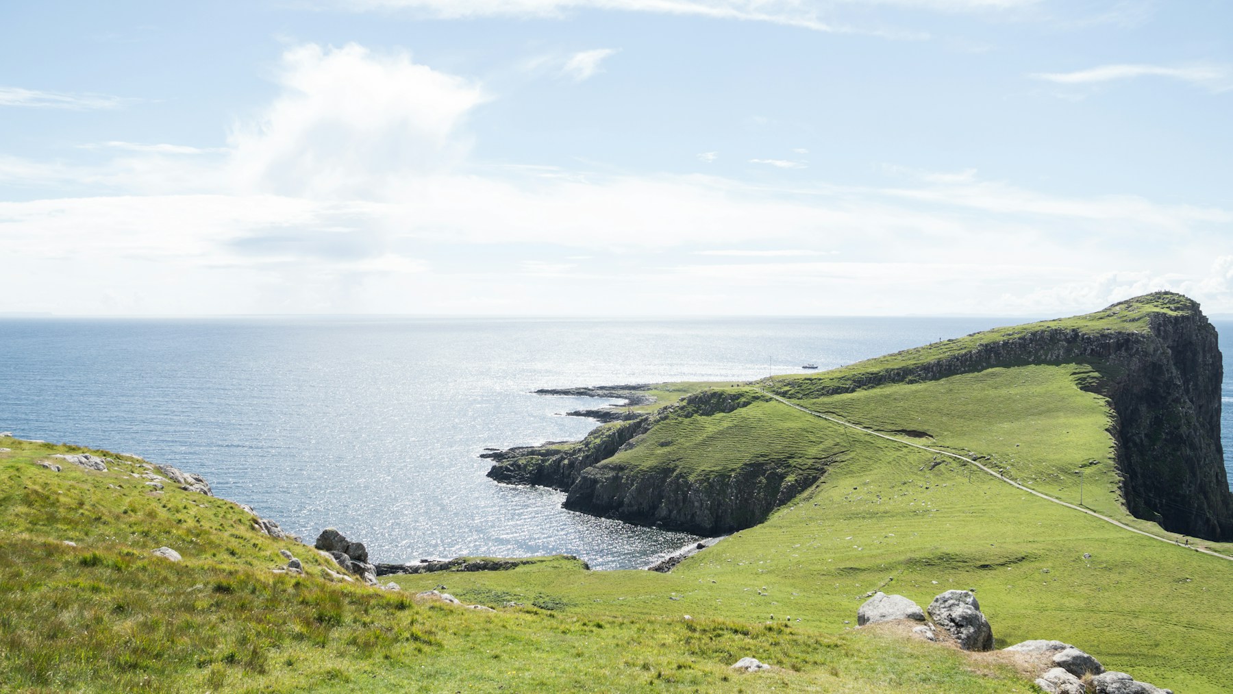 Green sea cliffs on the Isle of Skye coast in Scotland