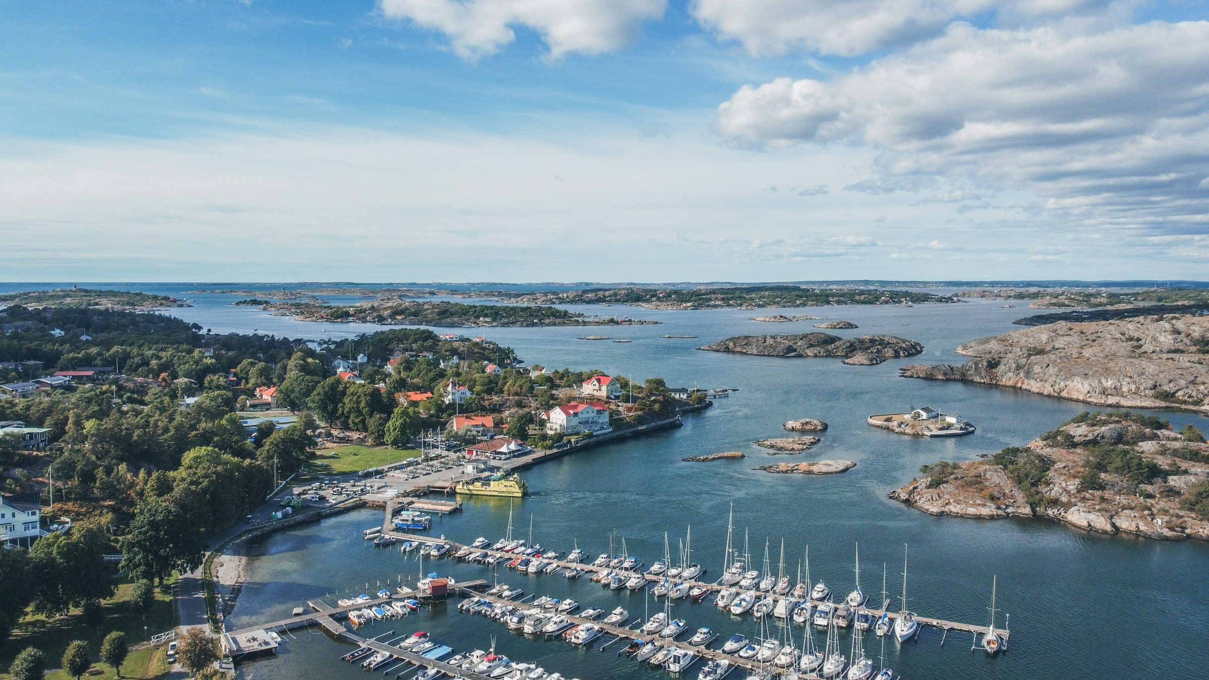Styrsö island settlement, passenger ferry, marina, and surrounding islands in Gothenburg's southern archipelago