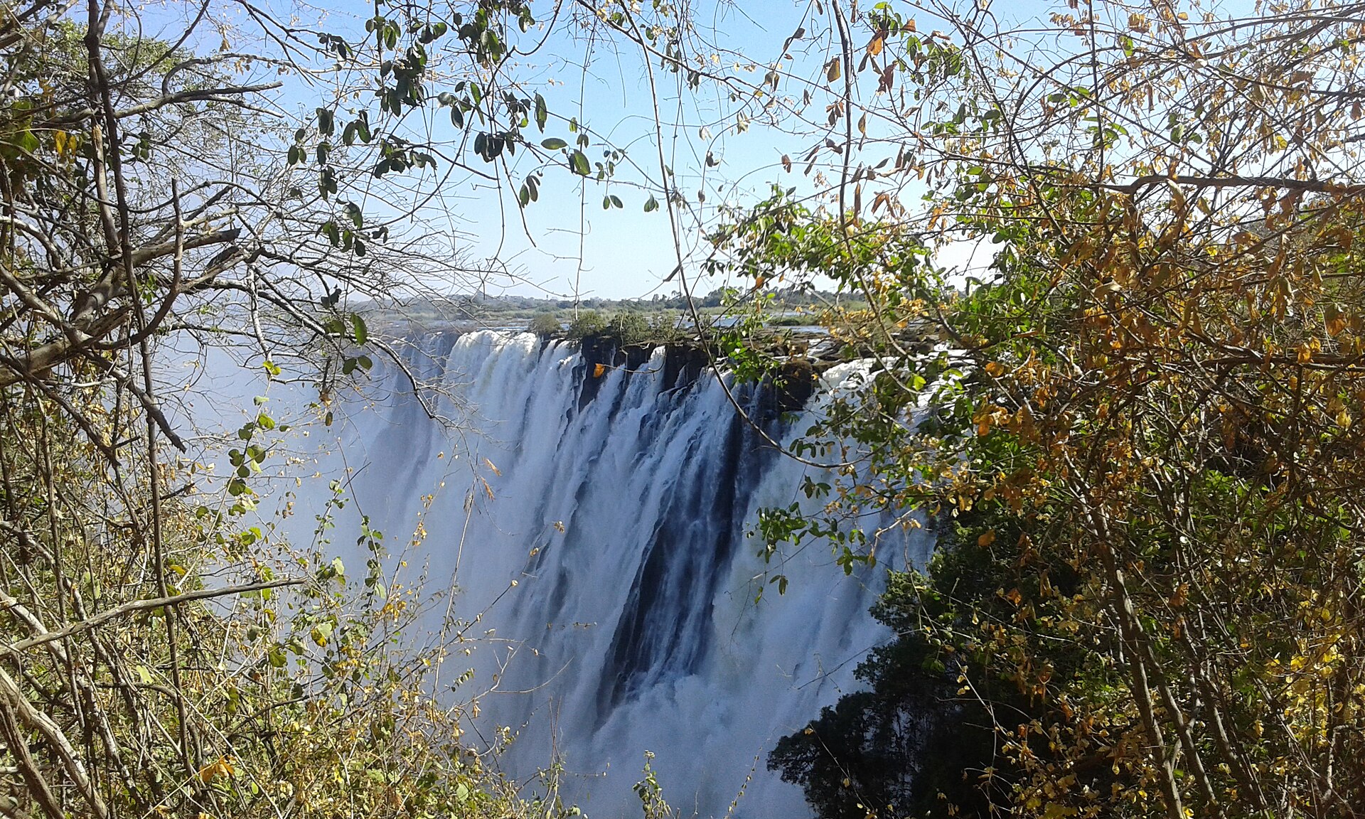 Victoria Falls seen through riverine forest from the Livingstone side in Zambia